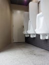 Toilet men`s room.Close up row of outdoor urinals men public toilet, Royalty Free Stock Photo