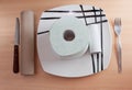 Toilet paper and cardboard food on oak table Royalty Free Stock Photo