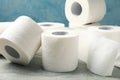 Toilet paper on grey table Royalty Free Stock Photo