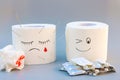 Toilet paper and pills. Concept of hemorrhoid treatment