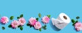Toilet paper with pink roses overhead view Royalty Free Stock Photo