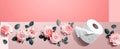 Toilet paper with pink roses overhead view Royalty Free Stock Photo