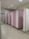 Toilet partition wall Finish with pink and grey color Prefabricated Melamine material Royalty Free Stock Photo