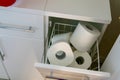 Toilet roll stock piled in home bathroom. Panic buying concept background