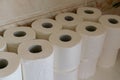 Toilet roll stock piled in home bathroom. Panic buying concept background. Blur shallow focus