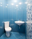 Toilet room in blue colors Royalty Free Stock Photo