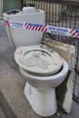 A toilet on the sidewalk in Paris