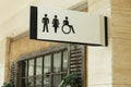 Toilet sign: male, female and handicapped in a shopping center. Close-up Royalty Free Stock Photo