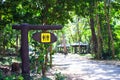 Toilet sign on wooden near the walkway with plant tree park on the mountain. tourist travel summer holidays adventure in the Royalty Free Stock Photo