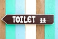 Toilet signs on the old wood wall background Royalty Free Stock Photo