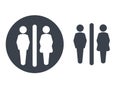 Toilet symbols on white background. White silhouettes in a dark grey circle and dark grey male and female icon on white backgroun