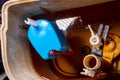 Toilet tank with rust and calcium buildups. Fixing a toilet cistern at home float mechanism. Royalty Free Stock Photo