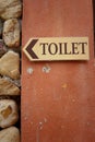 Toilet vintage label on a brown background. Royalty Free Stock Photo