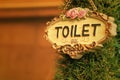 Toilet vintage label on a brown background. Royalty Free Stock Photo