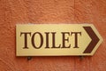 Toilet vintage label on a brown background. Royalty Free Stock Photo