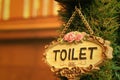 Toilet vintage label on a brown background. Royalty Free Stock Photo