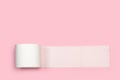 Toilete paper roll on a pink background Royalty Free Stock Photo