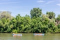 Tokaj, Hungary. May 12, 2018: Group of young people canoeing on Tisza river Royalty Free Stock Photo