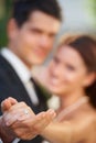 The token of their love. A newlywed couple showing you their rings while dancing on their wedding day. Royalty Free Stock Photo