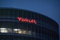 A Yakult building sign. A Japanese sweetened probiotic milk beverage fermented with the