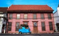 Jakarta, Indonesia : September 2019 Toko Merah Red Shop Colonial Old Building With Traditional Transportation Blue bajaj On Kuta