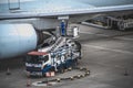 Ground crew refueling to the airplane Royalty Free Stock Photo