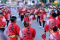 Tokushima, Japan - August 12, 2022: Performers in bright red traditional clothing at Awaodori festival