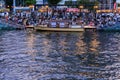 Tokushima, Japan - August 12, 2022: Small boat and crowd await night performance at Awaodori festival