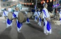 Tokushima, Japan - August 12, 2022: Taiko drummers march in procession at Awaodori street festival