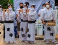 Tokushima, Japan - August 12, 2022: Traditional musicians wearing traditional clothes and masks at summer festival