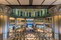 Motion blurred people conmuting and stainless steel columns at Tokyo Station. Royalty Free Stock Photo