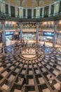 Motion blurred people conmuting and stainless steel columns at Tokyo Station Marunouchi building Royalty Free Stock Photo