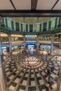 Motion blurred people conmuting and stainless steel columns at Tokyo Station Marunouchi building Royalty Free Stock Photo