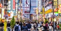 Tokyo busy street with neon signs in Shinjuku district, Japan Royalty Free Stock Photo
