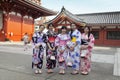 TOKYO - CIRCA JUNE, 2016: Japsnese teenage girls in kimonos at Sensoji-ji Red Japanese Temple in Asakusa, Tokyo, Japan