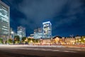 Tokyo city skyline at railway station surround by modern highrise building at twilight time. Royalty Free Stock Photo