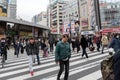 TOKYO, JAPAN - FEBRUARY 5, 2019: Tokyo Cityscape. People walks on Crossing. Shinjuku area. Japan