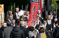 Men in a japanese cultural manifestation.