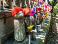 TOKYO, JAPAN - APRIL 5: Jizo Boddhisattvas at Zojo Buddhist Temple at Tokyo, Japan. Jizo Bodhisattva is the patron saint Royalty Free Stock Photo