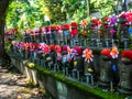 TOKYO, JAPAN - APRIL 5: Jizo Boddhisattvas at Zojo Buddhist Temple at Tokyo, Japan. Jizo Bodhisattva is the patron saint Royalty Free Stock Photo