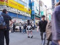 Tokyo, Japan - April 19, 2018 : maid cafe and people at Kabukicho