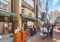 Japanese maneki-neko cats beckoning tourists in Yanaka-Ginza shopping street.