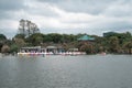 Swan paddle boats for rent in Shinobazu Pond in Ueno park with cherry blossom sakura