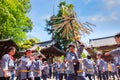 People parade through a street to Nezu-jinja shrine in Bunkyo Azalea Festival in Tokyo, japan