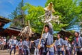 People parade through a street to Nezu-jinja shrine in Bunkyo Azalea Festival in Tokyo, japan Royalty Free Stock Photo
