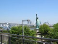 Statue of Liberty on Odaiba island on the background of modern high-rise buildings  in Tokyo, Japan. Royalty Free Stock Photo