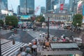 View of Shibuya Crossing, one of the busiest crosswalks in the world in a raining day