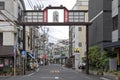 The gate leading to the old fashioned shitamachi village shopping district of Yanaka Ginza in northern Tokyo Royalty Free Stock Photo