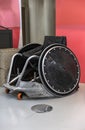 Professional sports wheelchair used in wheelchair rugby during Paralympics games.