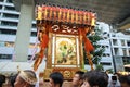 Several japanese men carrying a portable shrine Mikoshi for the Akebono-cho parade in Tachikawa